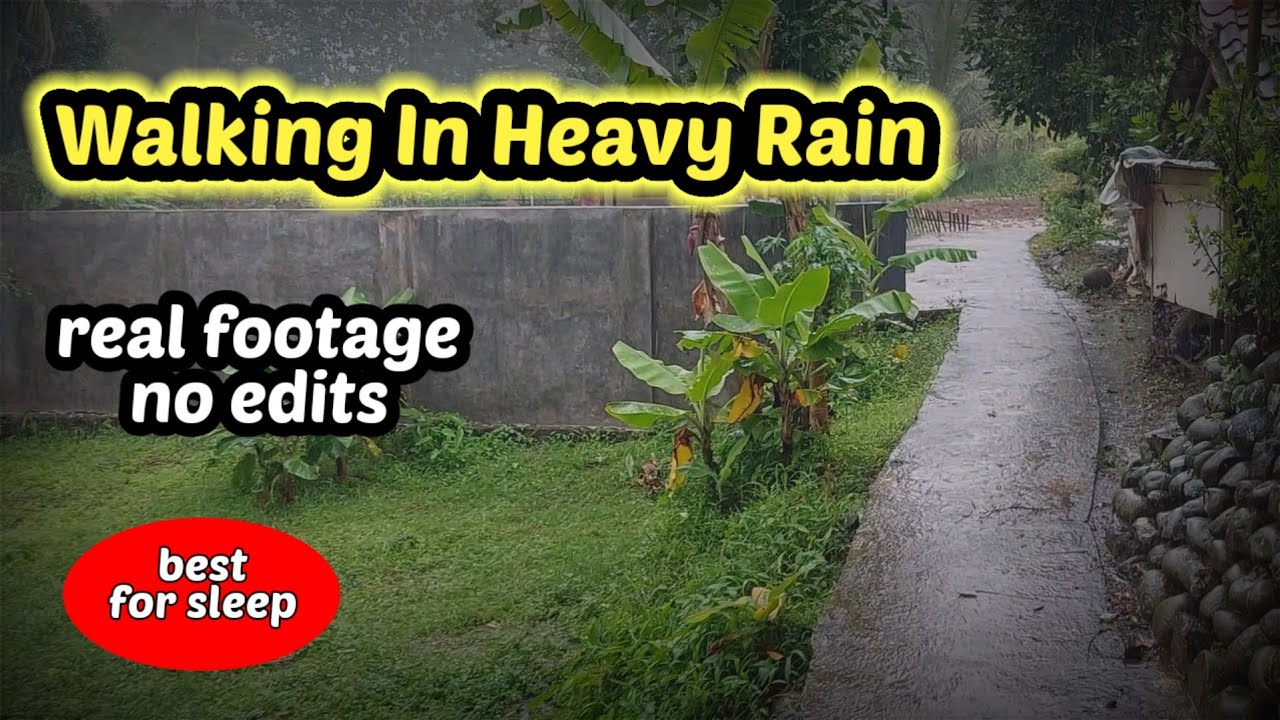 WALKING IN HEAVY RAIN