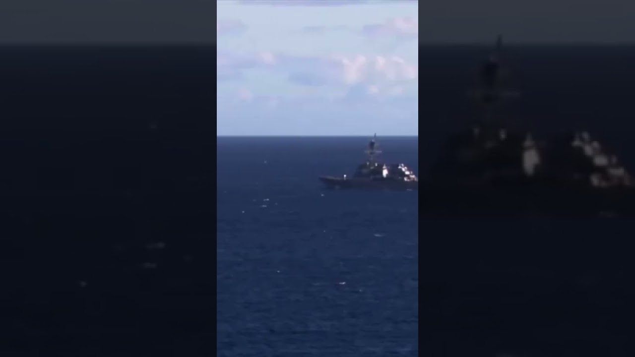 USS Lake Erie (CG-70) underway.   Lastly a DDG in the distance.    Haze Gray and underway.   2022.