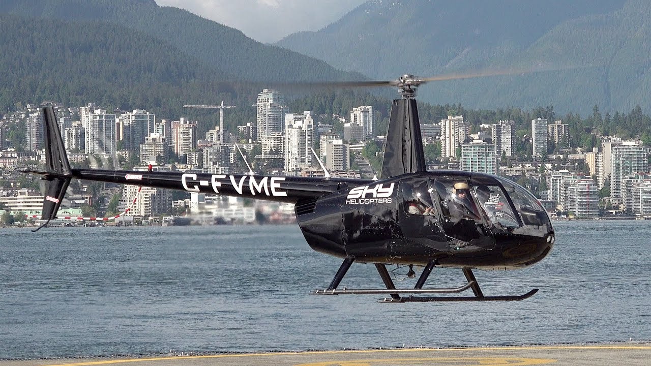 Sky Helicopters Robinson R44 C-FVME landing at the Vancouver Harbour Heliport