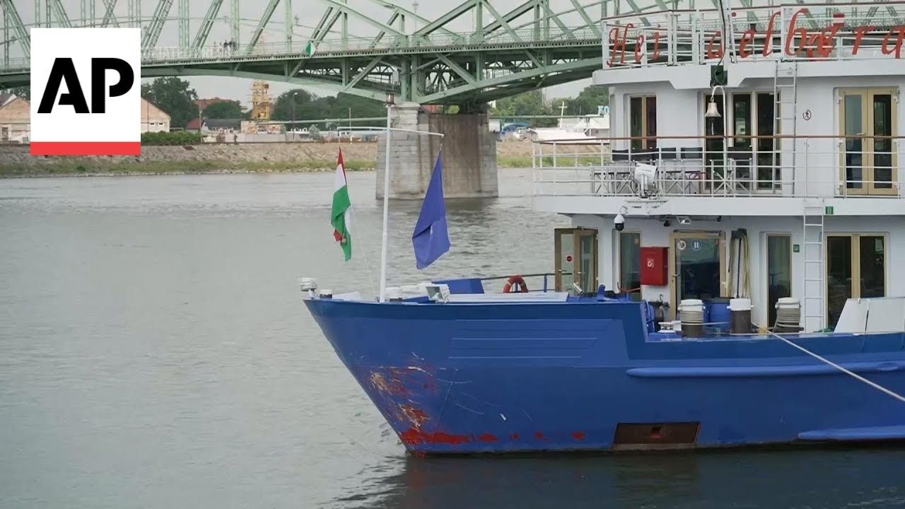 Tourists disembark boat after fatal collision on the Danube River in Hungary