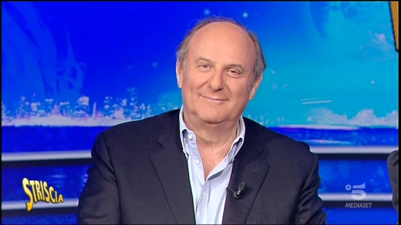 Striscia: Incredibile Famiglia Insolera. Gerry Scotti, Michelle Hunziker.