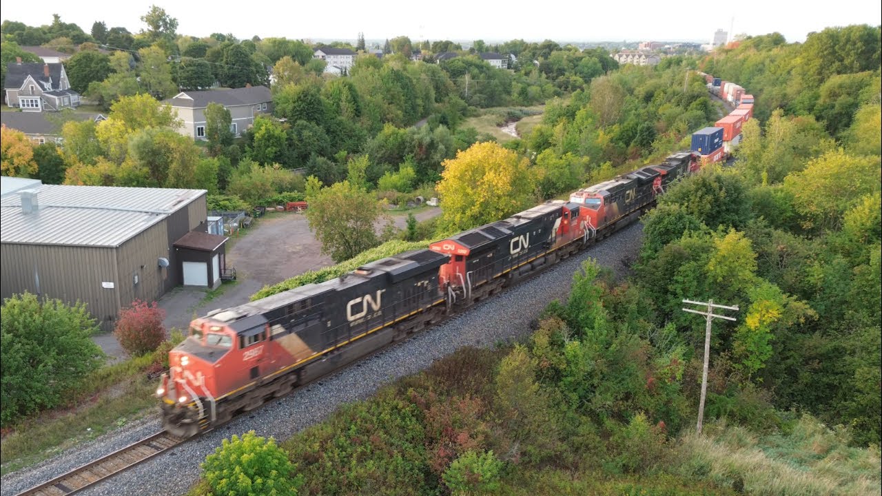 Awesome Aerial 4K View! Big Stack Train CN 120 w/DPU heading out of Moncton, NB