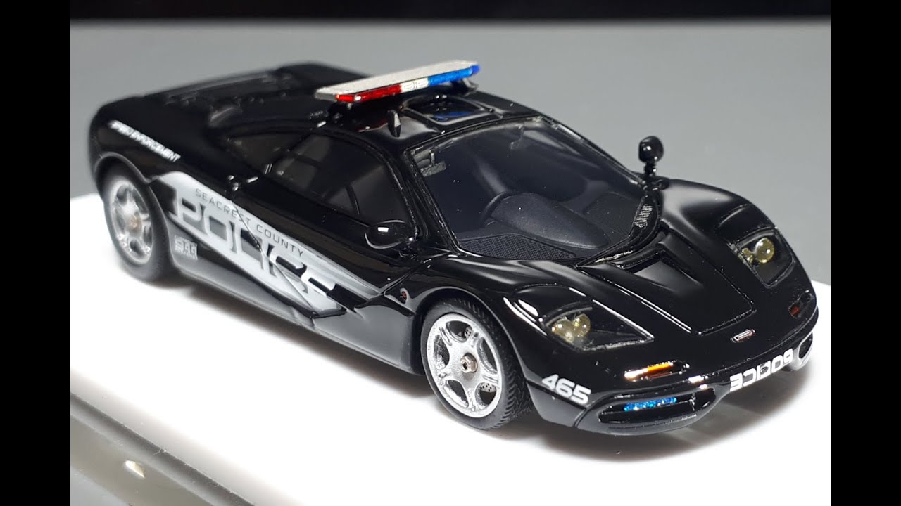Обзор масштабной модели автомобиля McLaren F1 NFS Police RCPD в масштабе 1/64 от M64X (модель MY64).