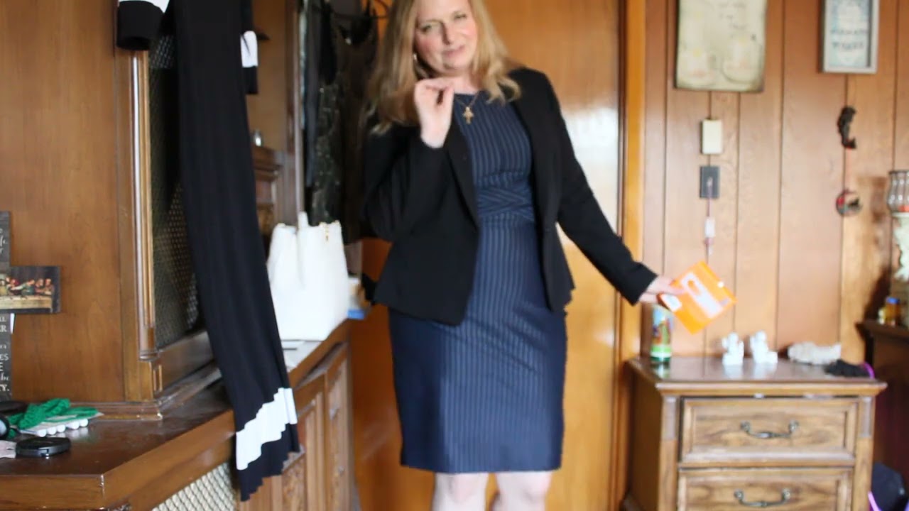 Blue dress outfit complete with hosiery and heels