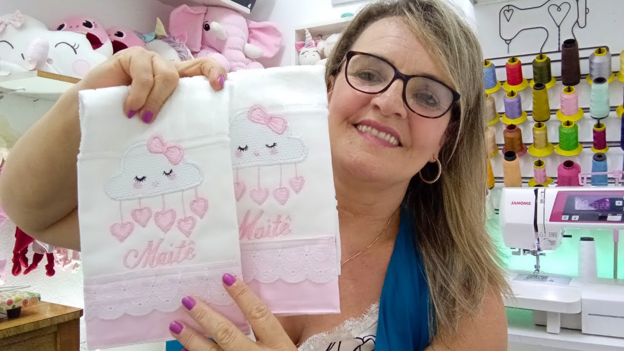TOALHA CHUVA DE AMOR (bordada em maquina de costura)