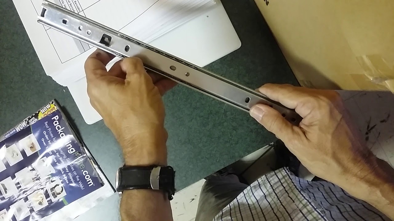 Keyboard tray rail removal