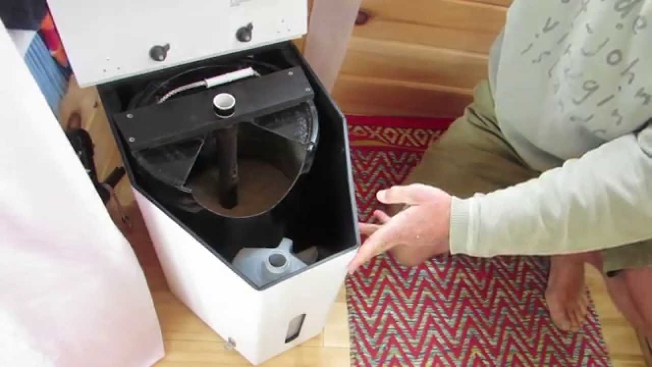 Emptying and Replacing the Waste Reservoirs in the Composting Toilet in the Tiny Houseboat