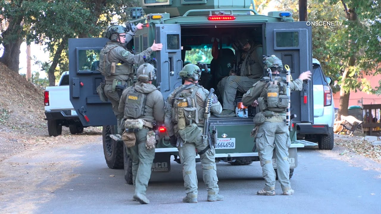 Man Threatening To Burn Down House at SWAT Stand Off