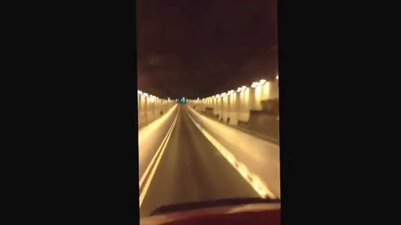 Truck driving through secret underground tunnel