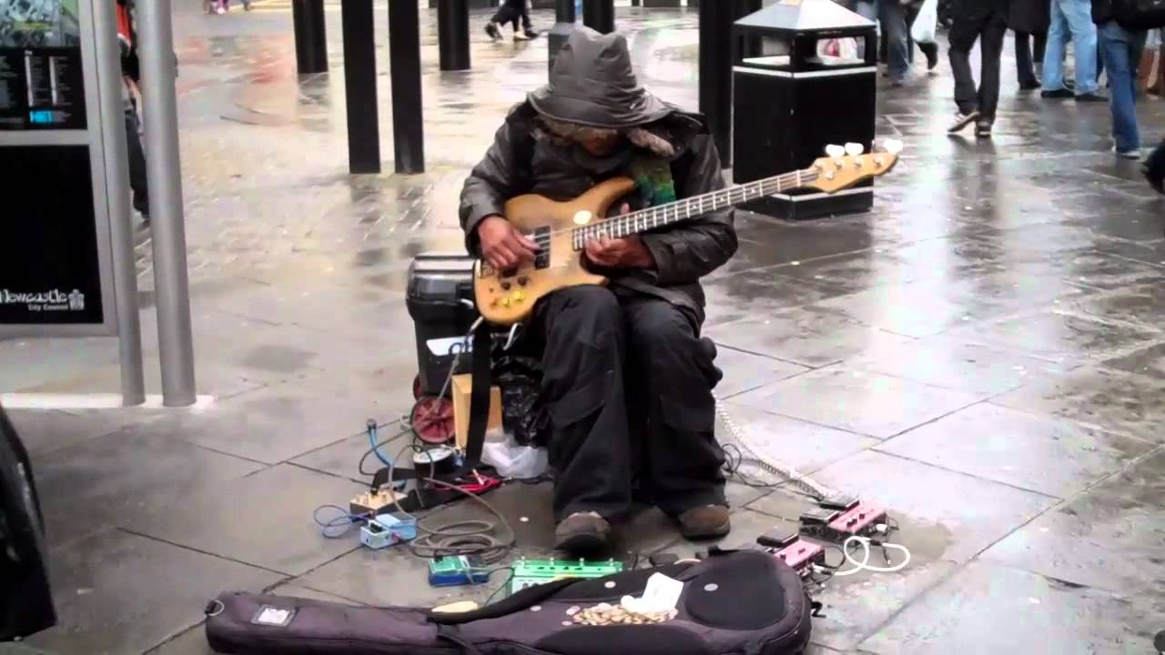 Ojay. Fantastic bass guitar busker on Northumberland Street, Newcastle upon Tyne