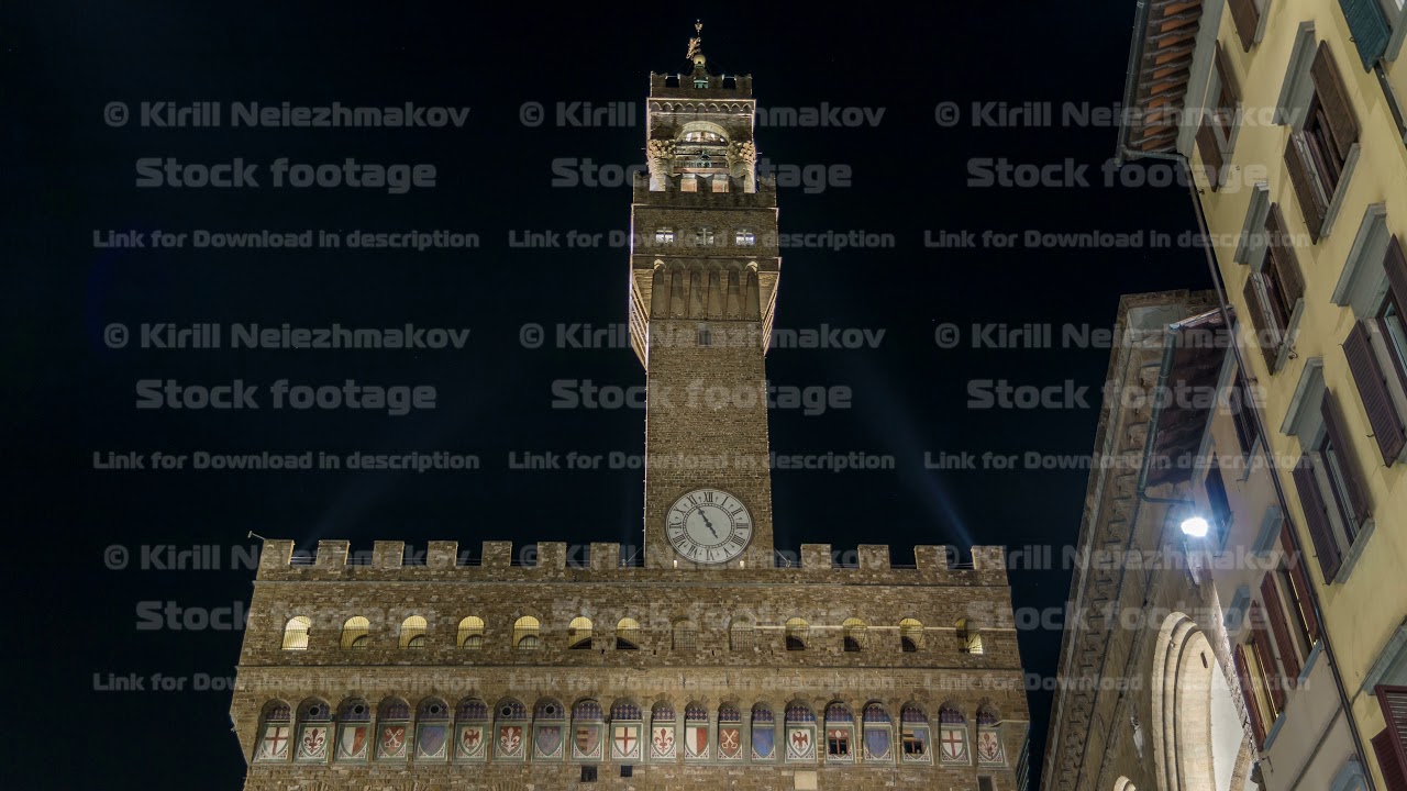 Famous Arnolfo tower of Palazzo Vecchio timelapse on the Piazza della Signoria at twilight in