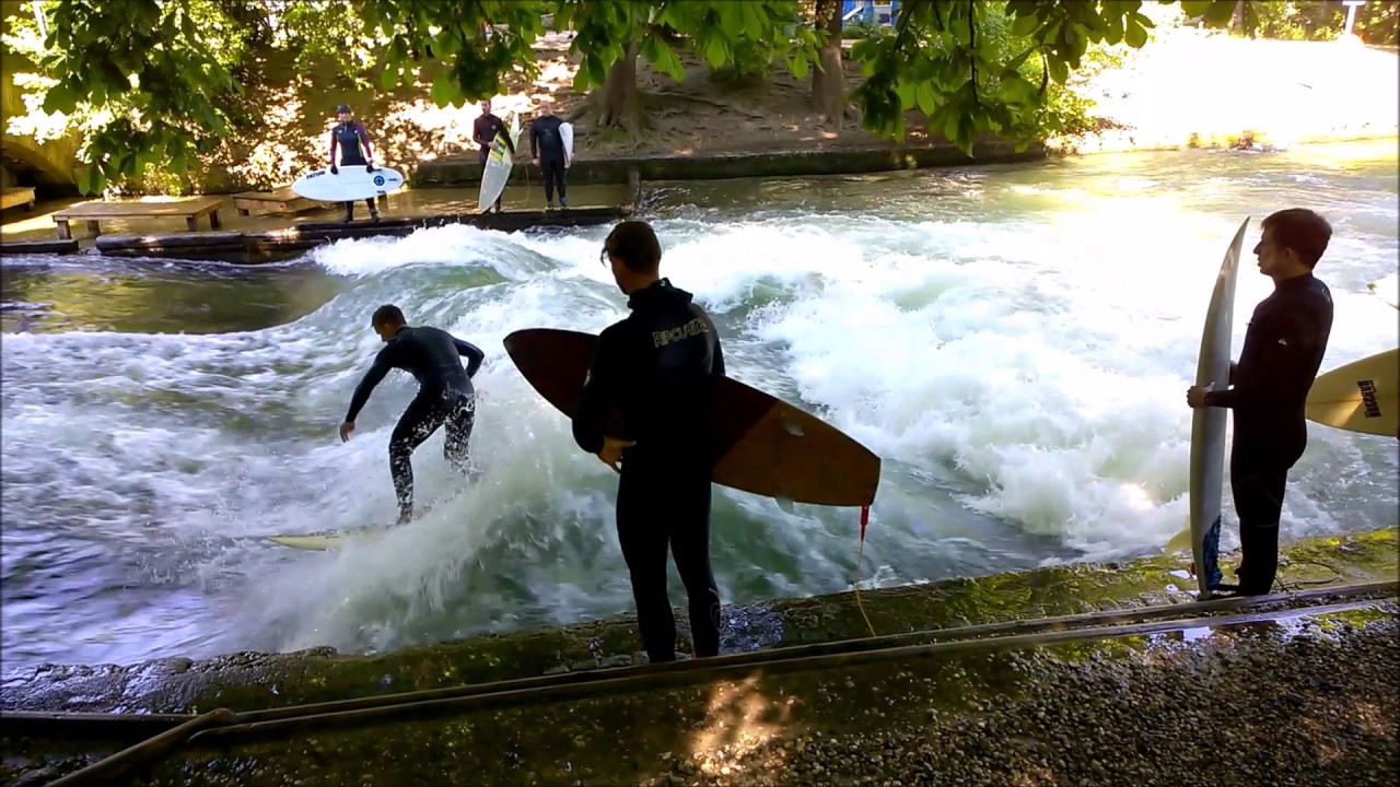 River surfing on the Eisbach in the English Garden Munich Surfen im Englischen Garten München by Kar