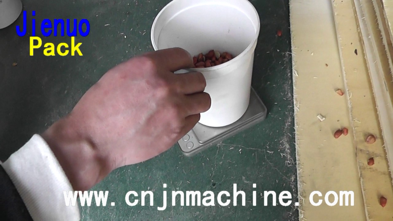 Semi automatic volumetric cup packing machine