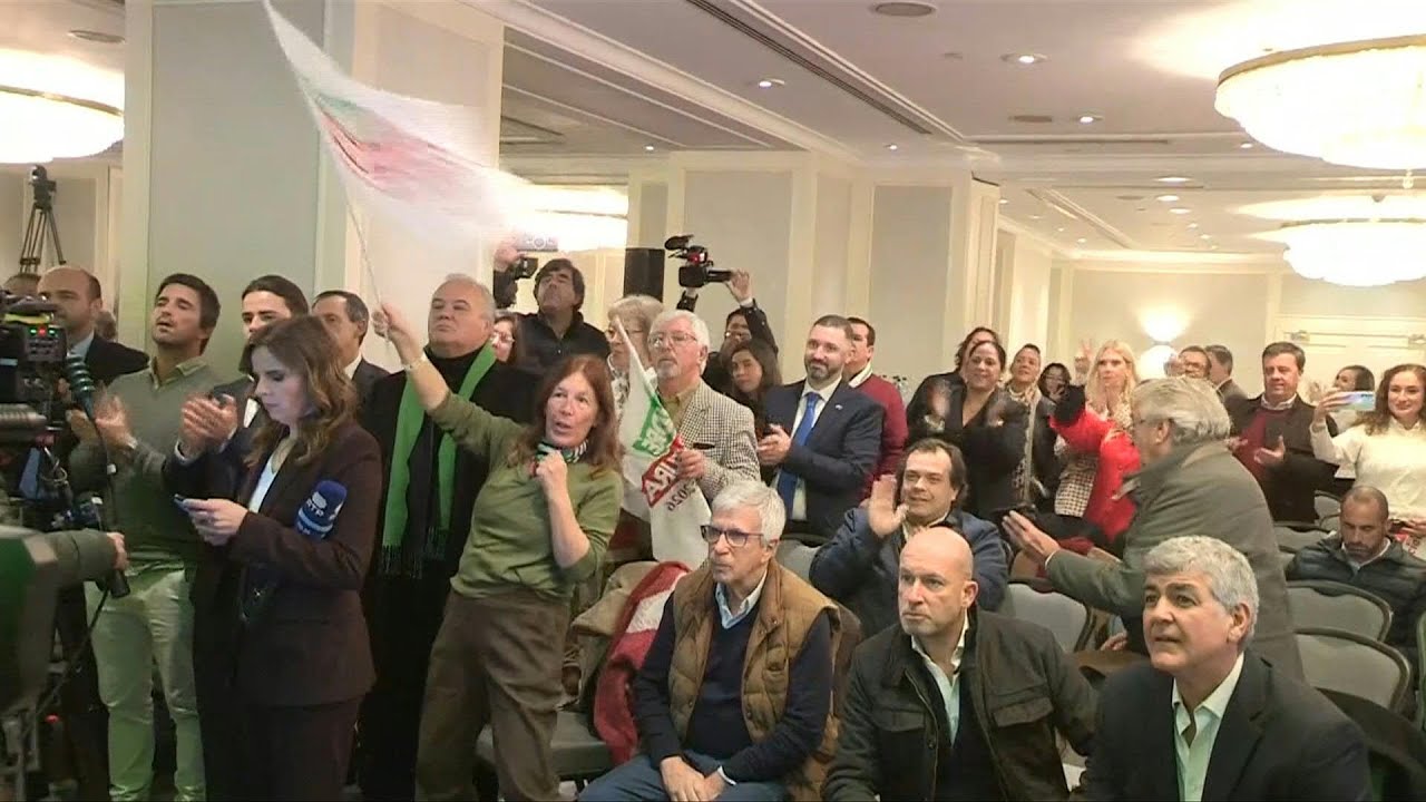 Ventura supporters cheer exit poll results as far-right surge expected in Portugal election | AFP