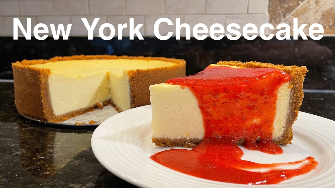 Creamy New York Cheesecake w/ Strawberry Sauce