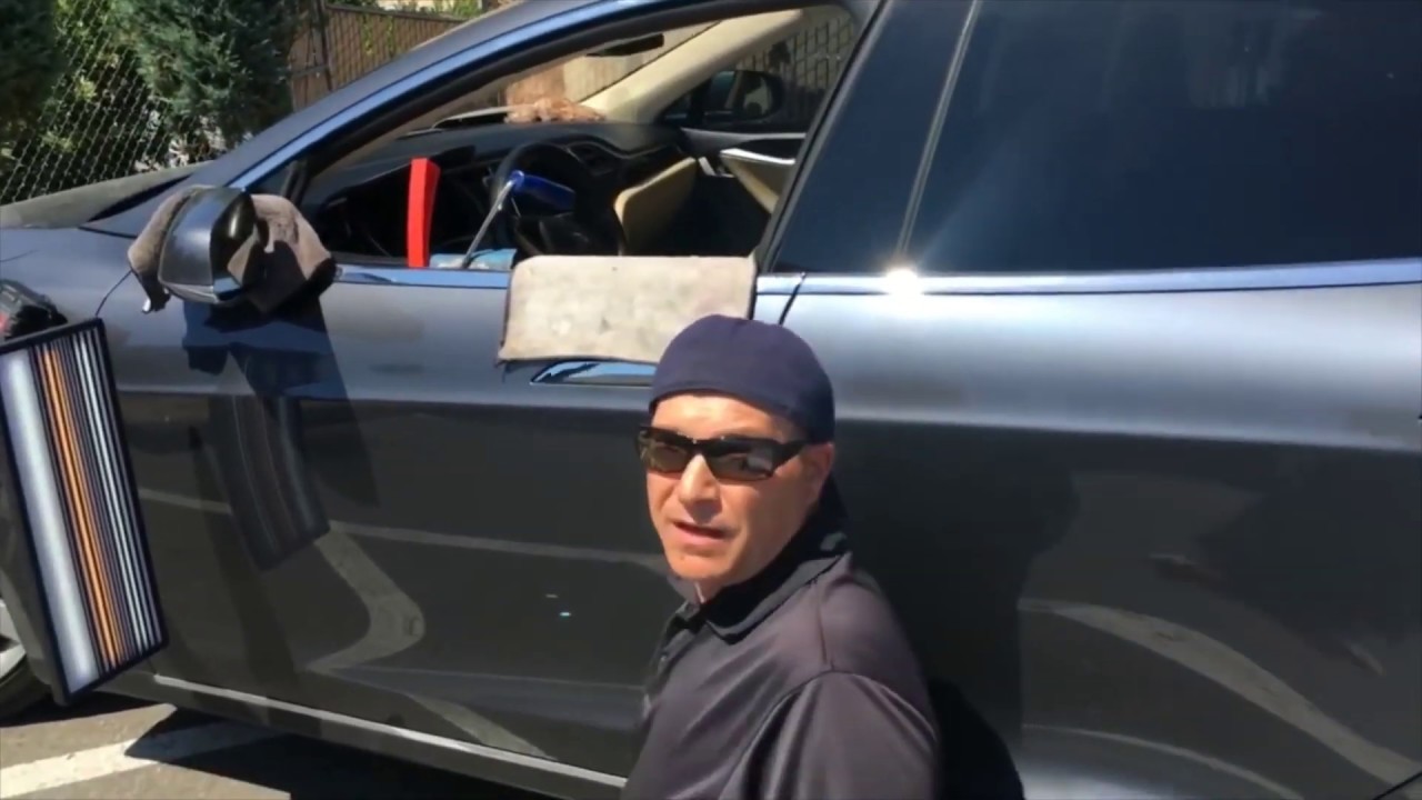 Tesla Model S gets Undented! #pdr #Tesla #paintlessdentrepair #petersondentrepair