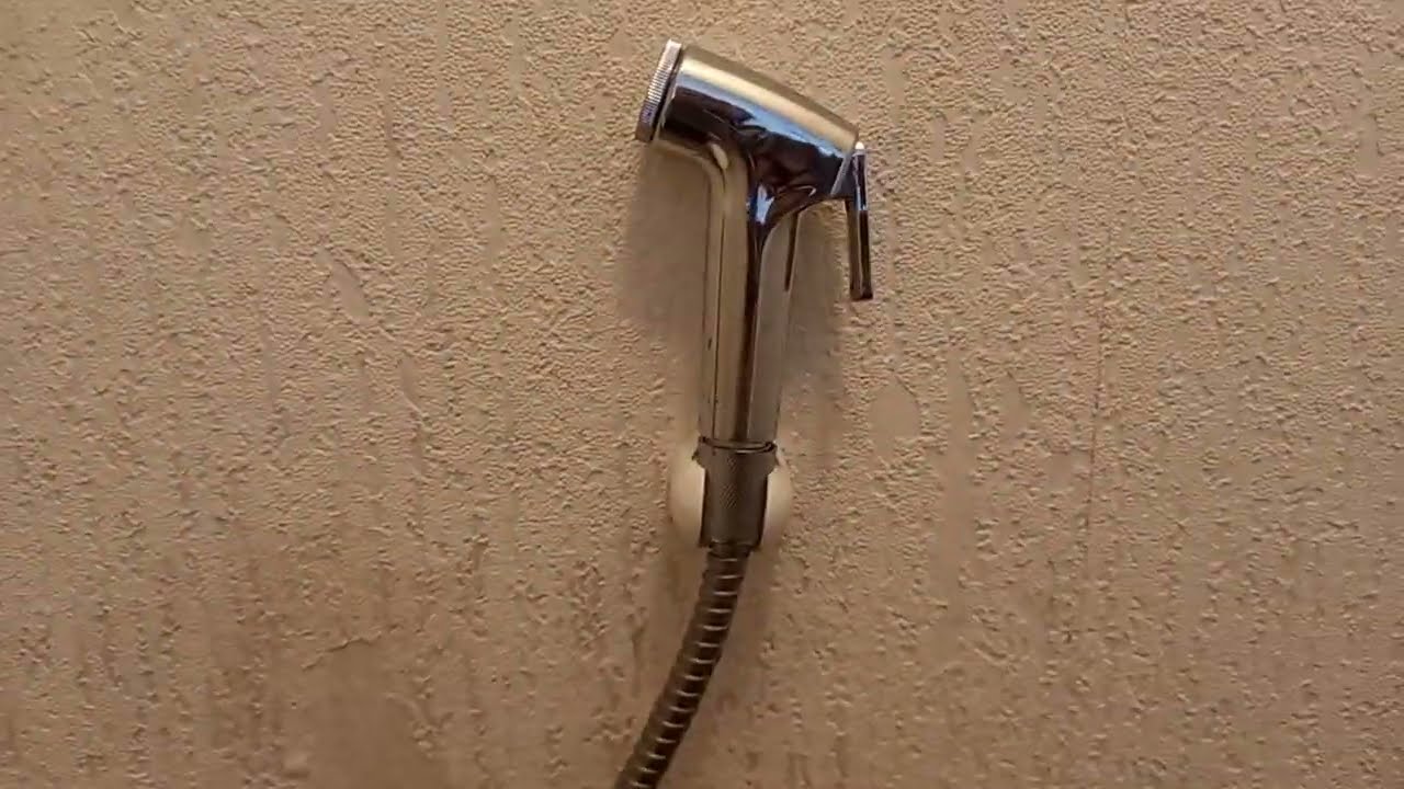 CHANGER DOUCHETTE WC