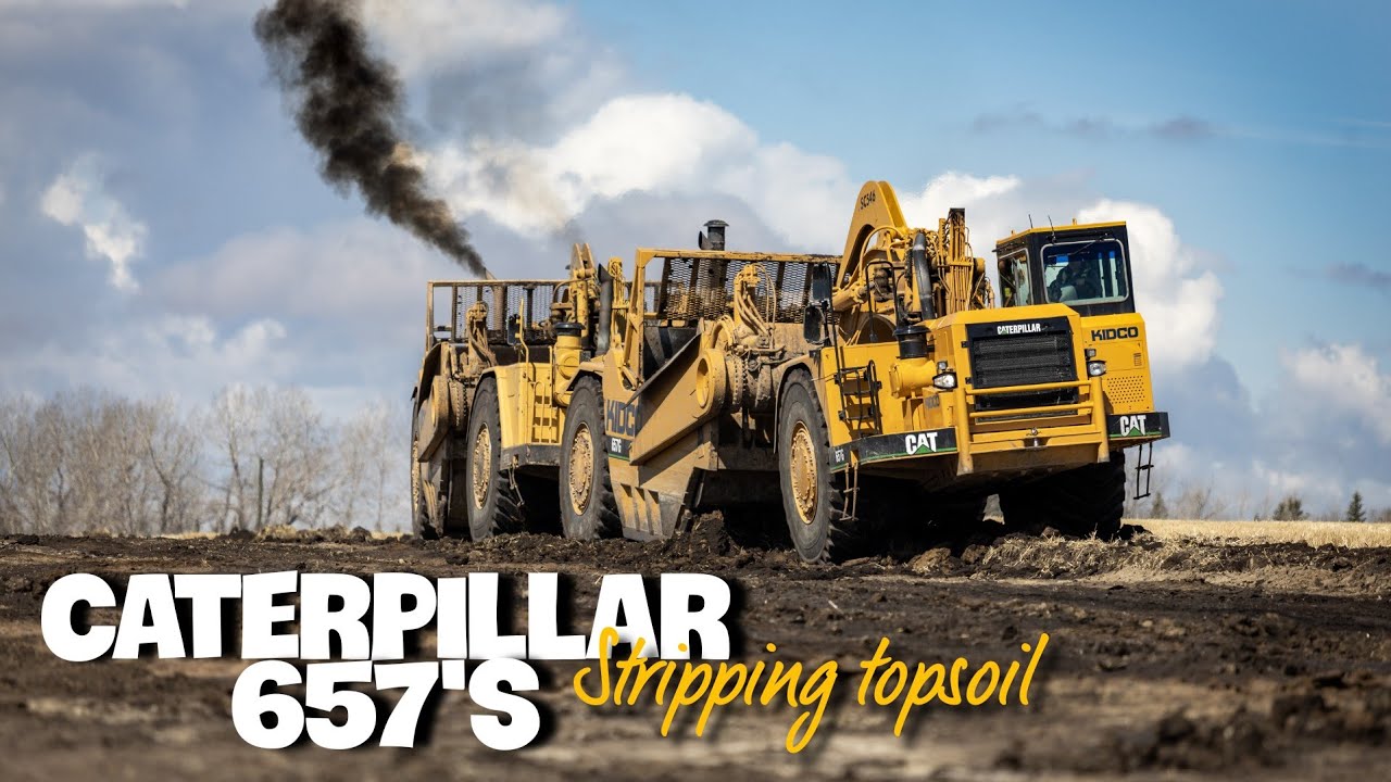Stripping topsoil with the biggest scrapers they make...| CATERPILLAR 657's