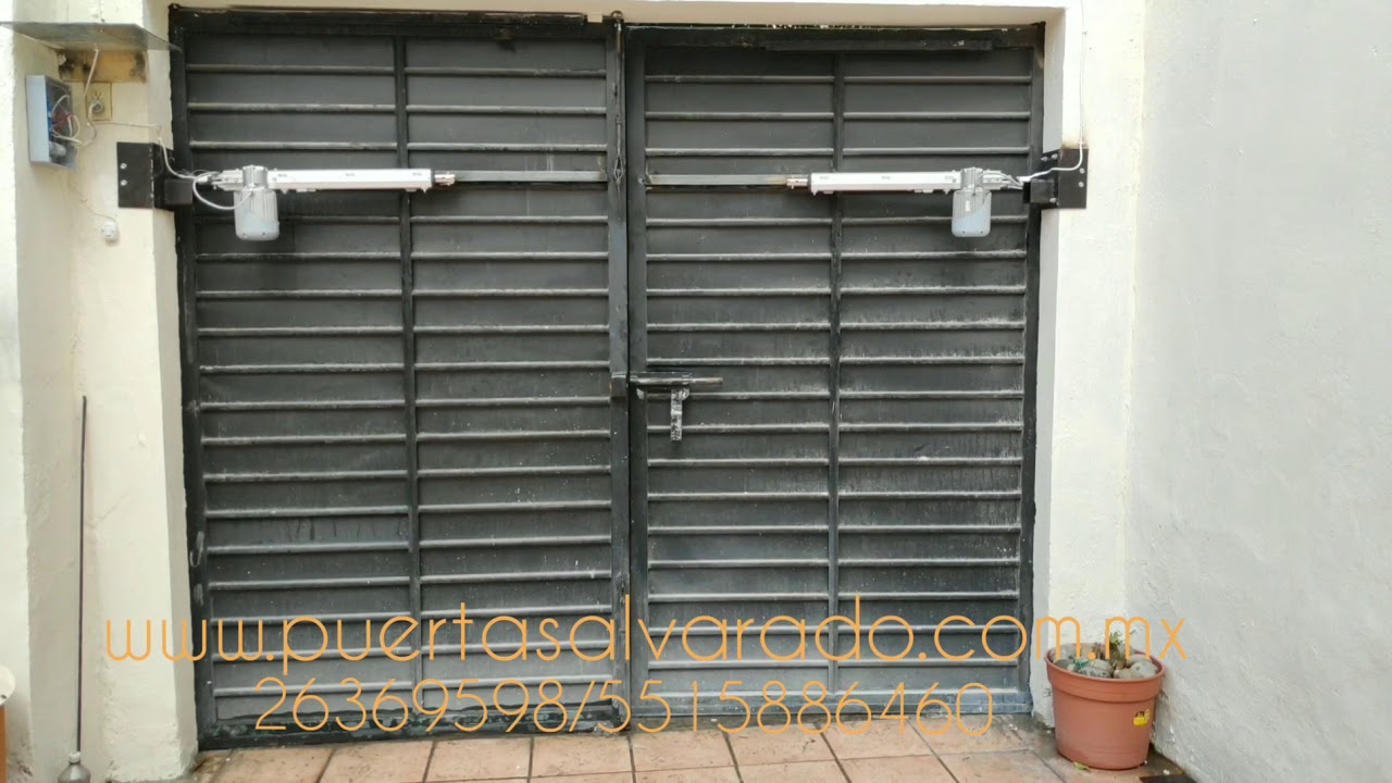 &iexcl;Olv&iacute;date de mojarte al abrir tu cochera! - Puerta Abatible Autom&aacute;tica #SEG Pivus D&uacute;o