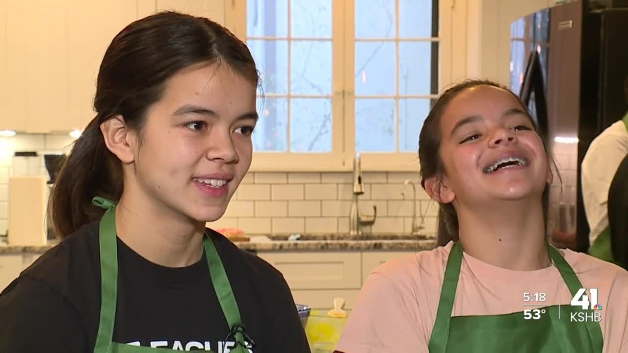 Sisters use hot cocoa stand proceeds to pay back parents for Taylor Swift tickets