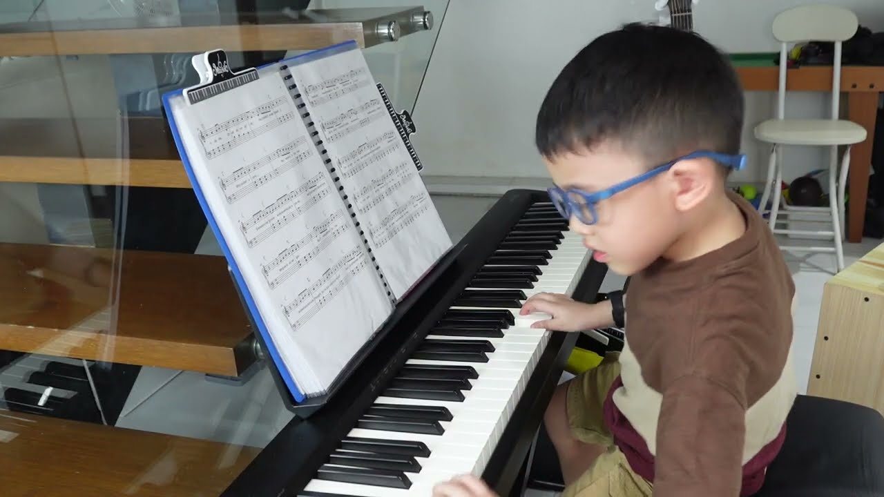 Astron Kailo – 5-year-old kid playing piano Opalite by Taylor Swift