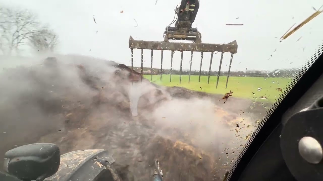 Moving muck with the manitou mlt635 preparing the muck heap ready to cart more in