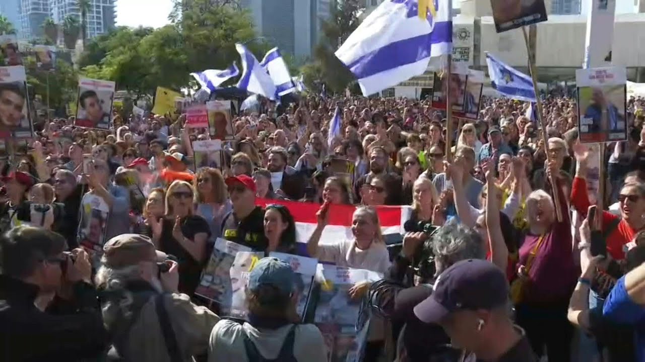 Israelis in Tel Aviv cheer as seven hostages released in third exchange | AFP