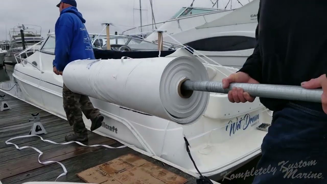 KKM Tech-How to Shrink Wrap a 26' Wellcraft Martinique in the Water