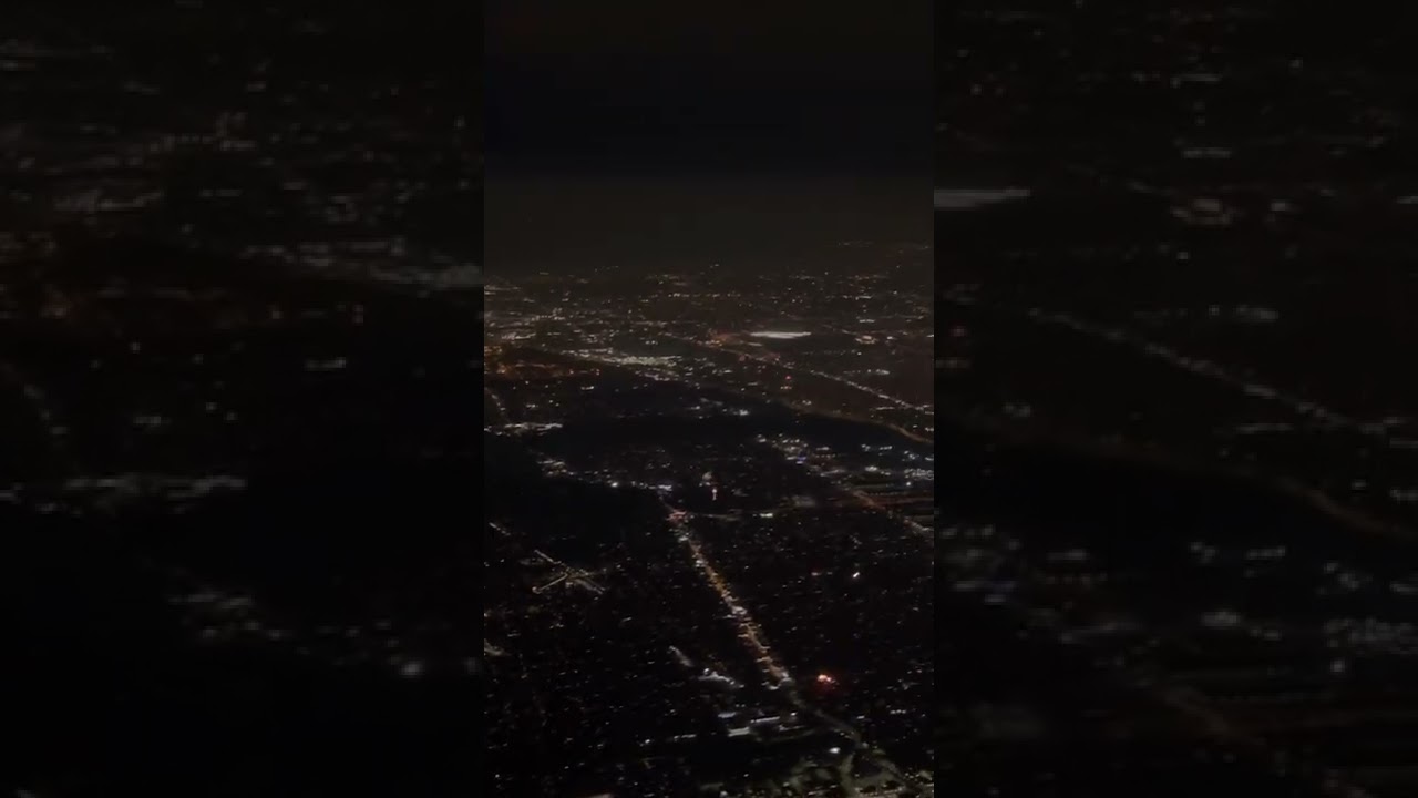 Fireworks all over the City of Chicago July 4th during airplane takeoff from Chicago O’Hare Airport