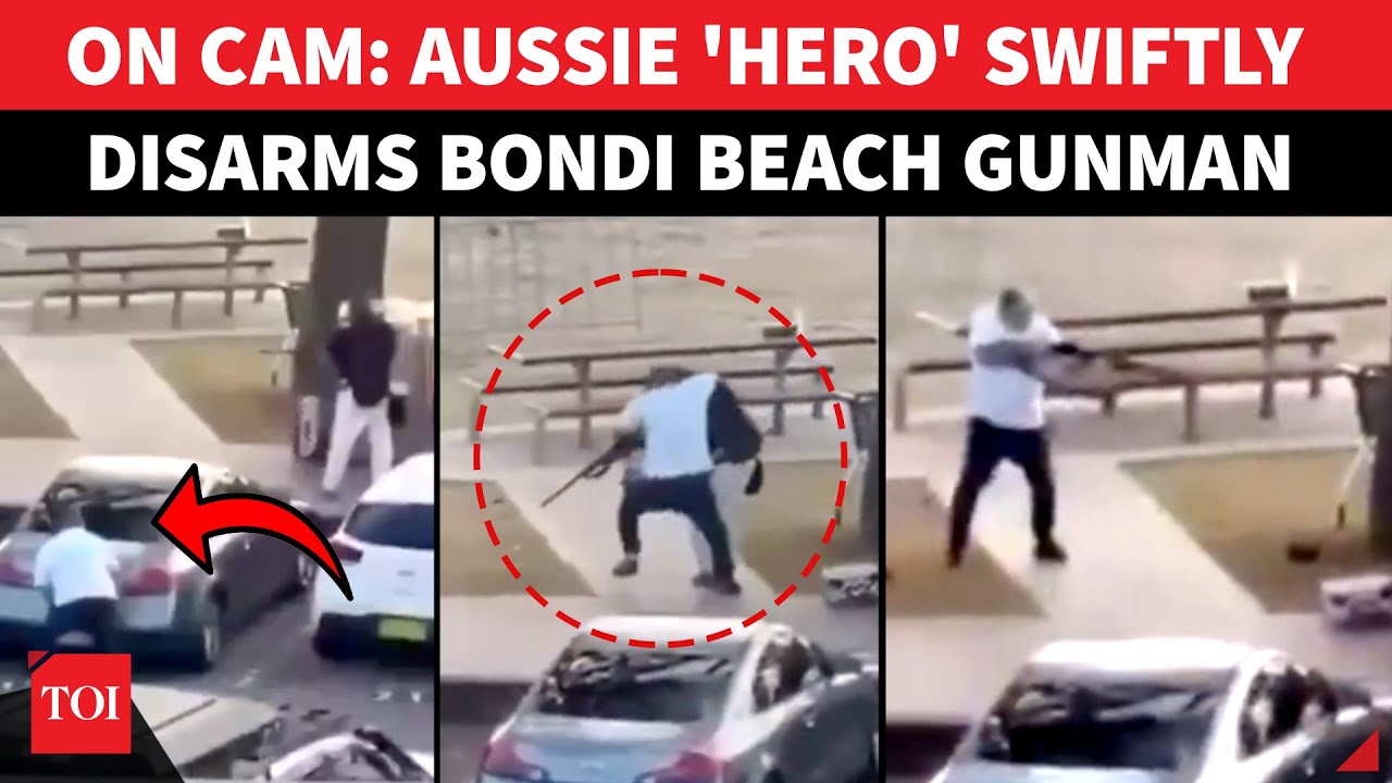 Sydney Attack VIDEO: Australia Man Grabs Gunmen, Snatches Rifle, Forces Him&nbsp;To&nbsp;Flee&nbsp;|&nbsp;WATCH