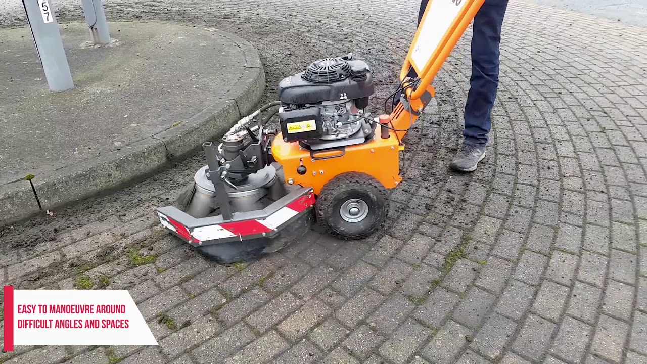 Weedo II - moss and weed removal brush In action