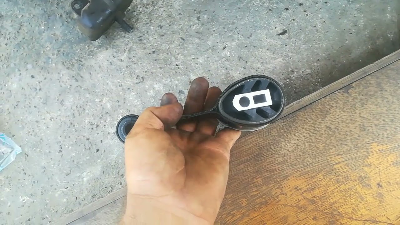 reemplazo de soportes de motor y transmisión de un auto saturn