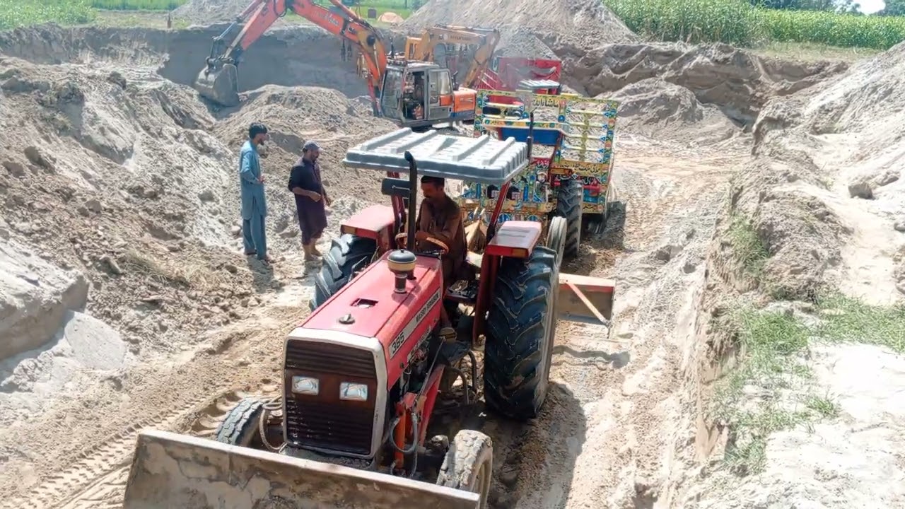 2 MF 385  ,MF 260 rat wali traly ko nikalty huvy