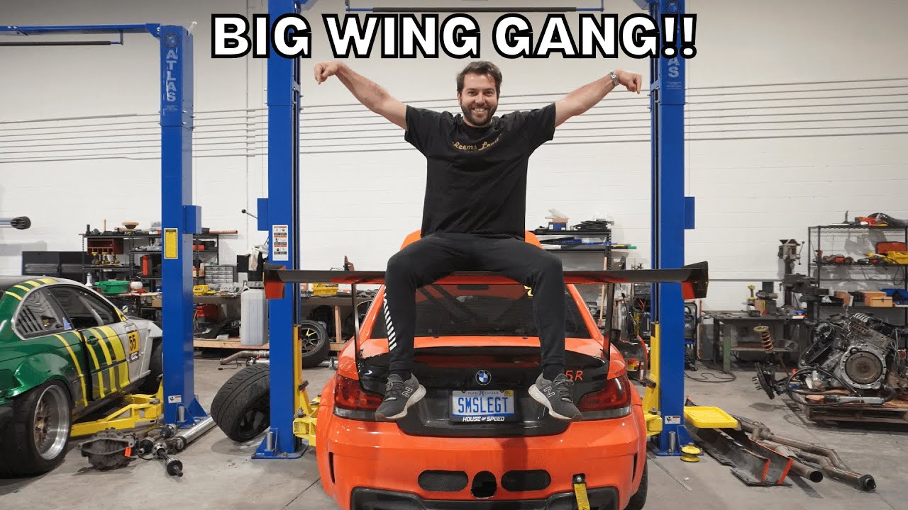 Huge Swan Neck Wing Install on the BMW 1M!