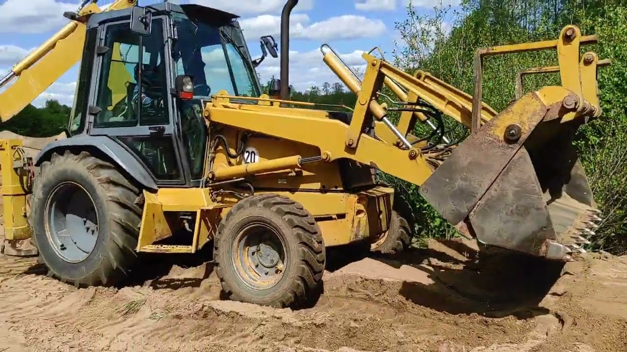 Case 580 SK równanie terenu