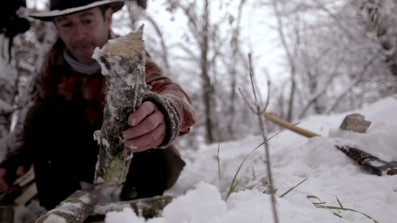 Cooking on the fire in the snow storm