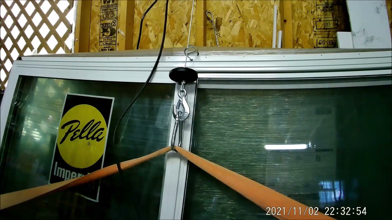 large window replacement using electric hoist