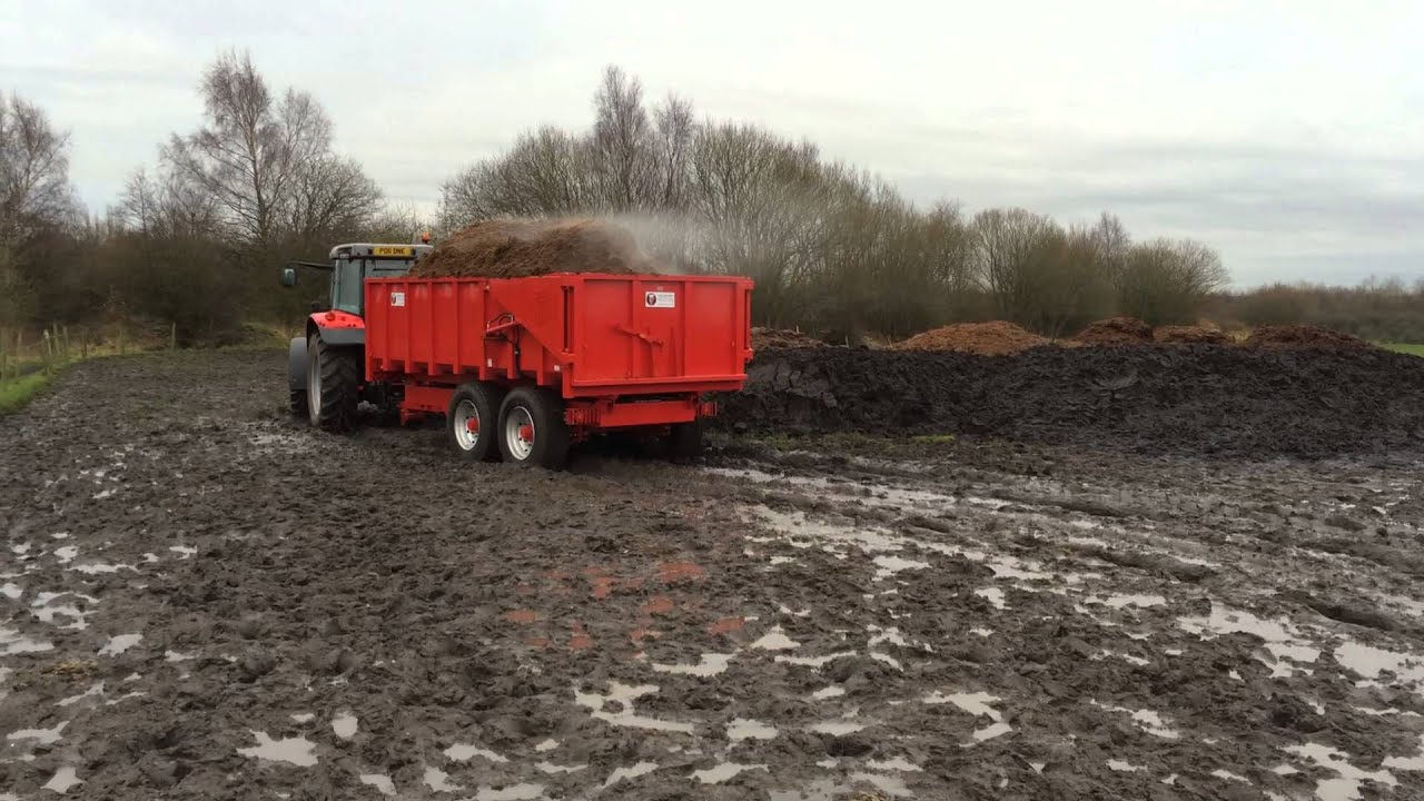 Mucking out with MF & Kubota