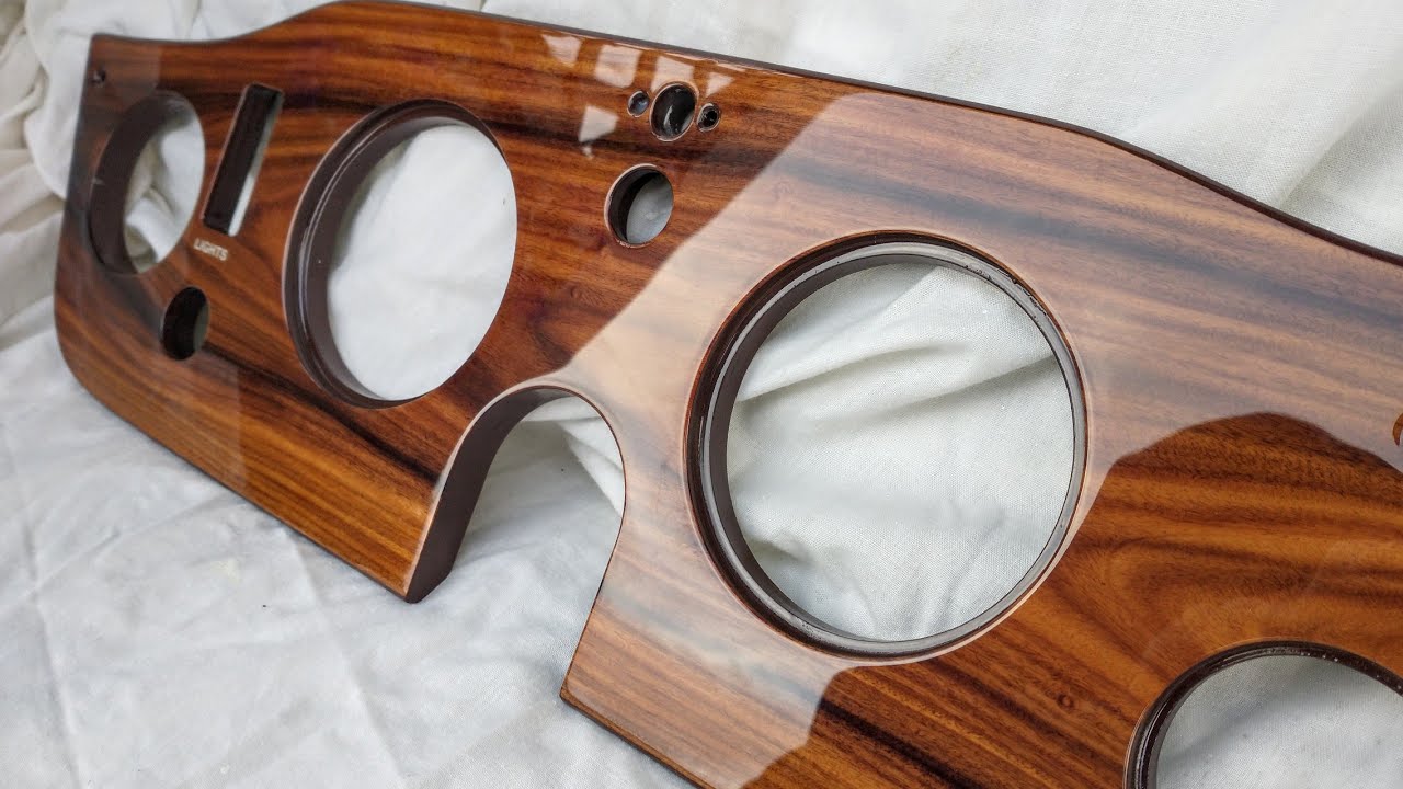 Custom Triumph TR6 dash panel in santos rosewood.
