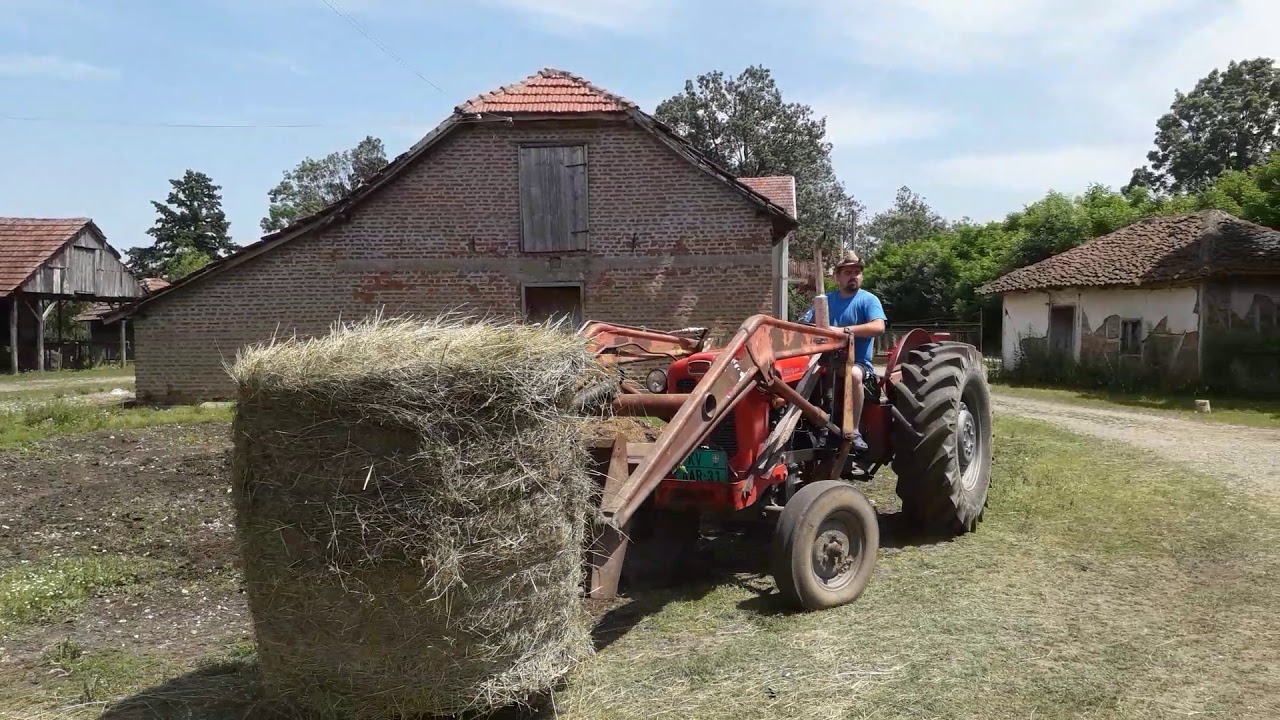 IMT 558 istovaranje bala😀