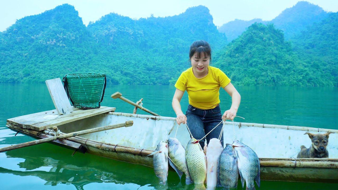 Catching fish, i caught but how big the fish on the lake. the life of a young girl on the lake