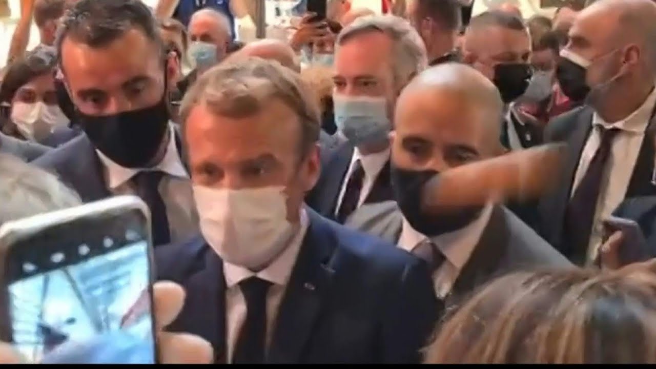 French President Emmanuel Macron hit with egg during restaurant fair visit | AFP