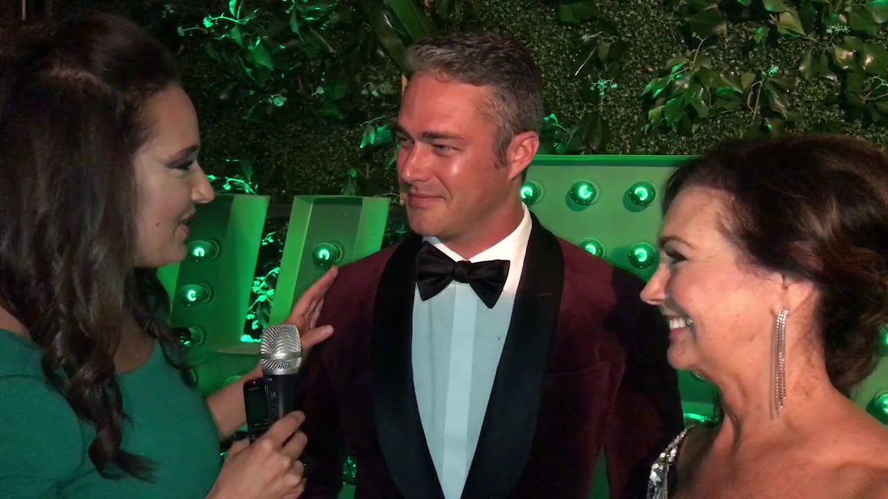 Showbiz Shelly talks to Taylor Kinney and his mom at the Green Tie Ball