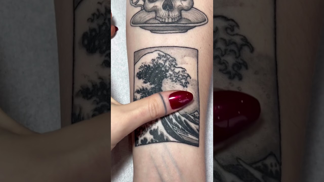 Healed Hokusai wave tattoo