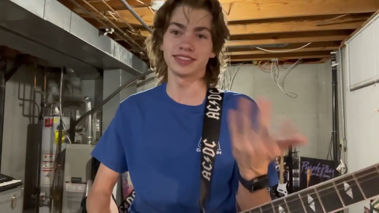 A Dork ￼talking about himself with a guitar in his hand￼