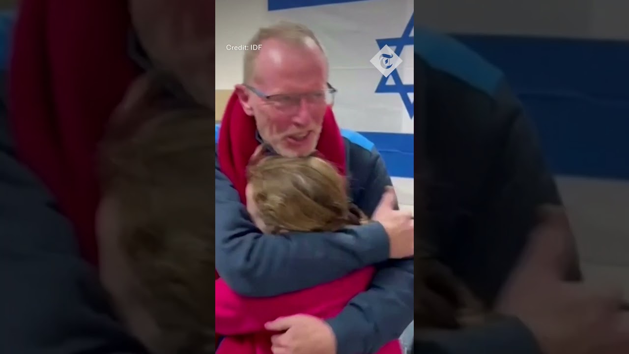 Moment Israeli child hostage is reunited with her father, after being held in Gaza by Hamas