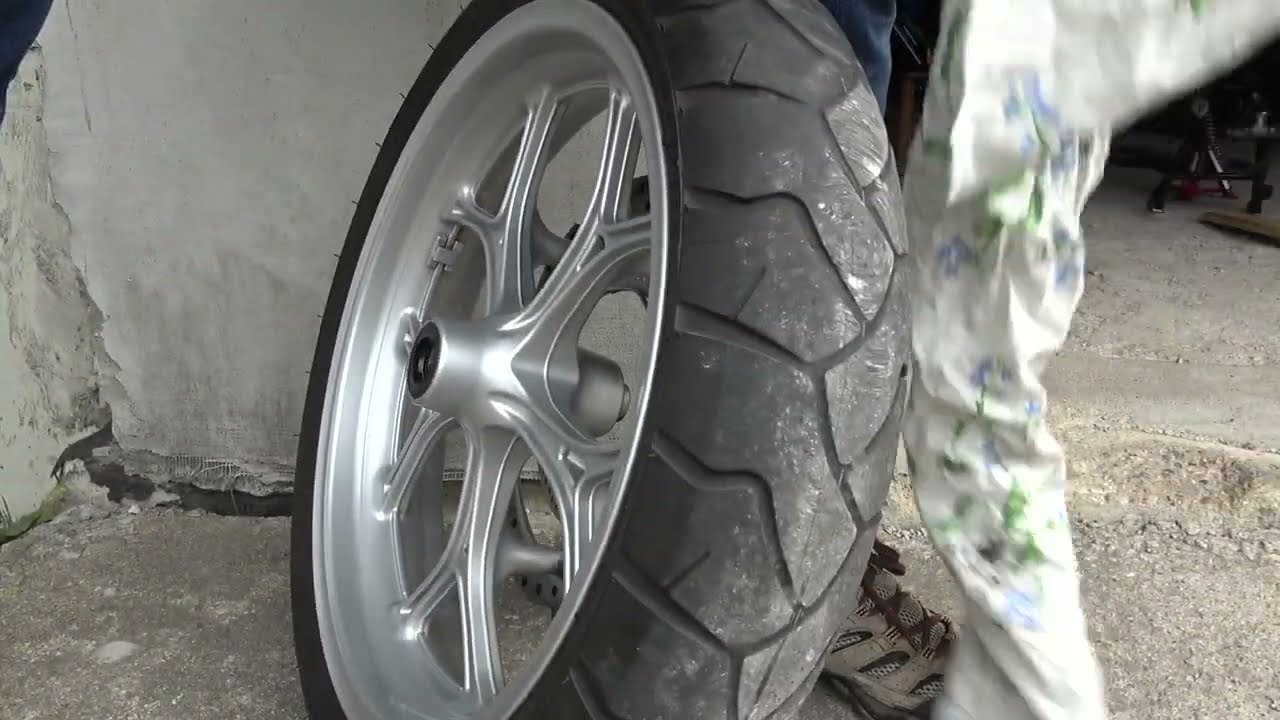 Honda NC750X как снять переднее  колесо