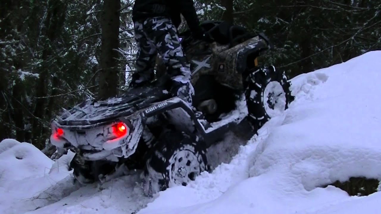 Can-am outlander 1000 xmr hill climb in the snow 2015