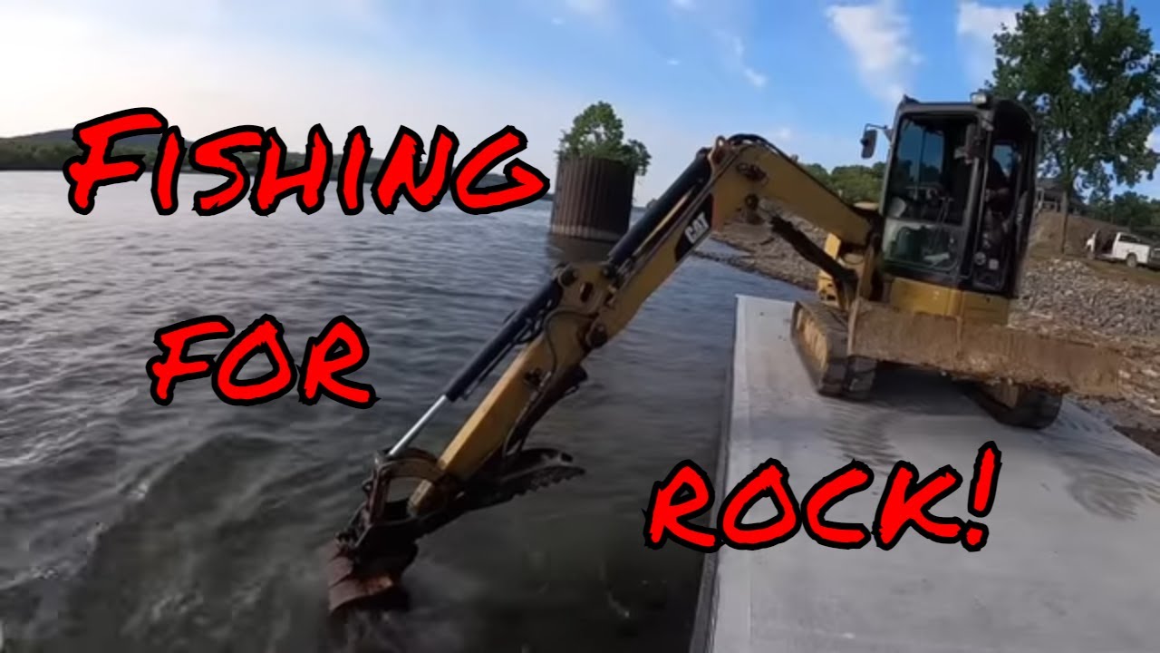 Pumping 50 plus yards of concrete for boat dock and dredging the rock back out in front of wall