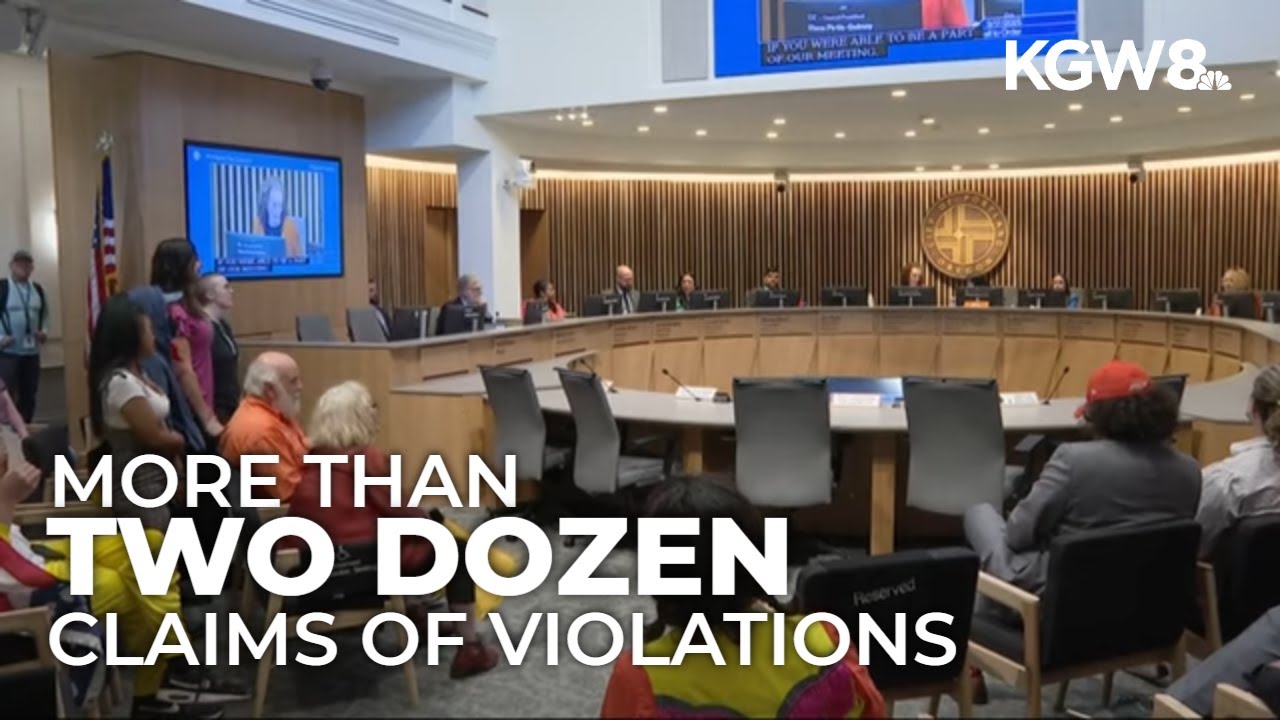 Protesters halt Portland city council meeting over ICE facility; mayor cites 25 land use violations